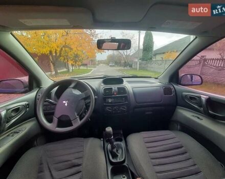 Синий Мицубиси Спейс Стар, объемом двигателя 1.6 л и пробегом 260 тыс. км за 2700 $, фото 6 на Automoto.ua