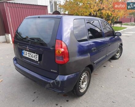 Синий Мицубиси Спейс Стар, объемом двигателя 1.6 л и пробегом 260 тыс. км за 2700 $, фото 1 на Automoto.ua
