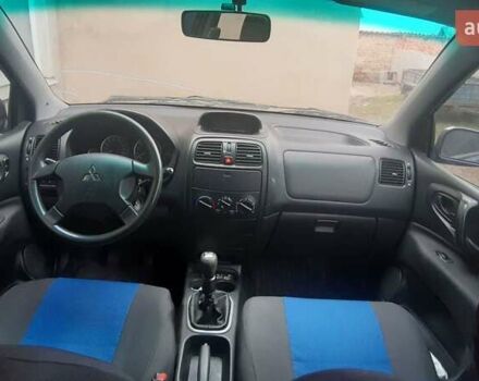 Синий Мицубиси Спейс Стар, объемом двигателя 1.6 л и пробегом 440 тыс. км за 3900 $, фото 2 на Automoto.ua