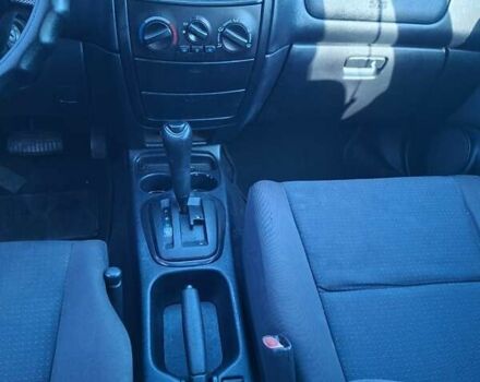 Синий Мицубиси Спейс Стар, объемом двигателя 1.8 л и пробегом 200 тыс. км за 2000 $, фото 2 на Automoto.ua