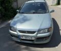 Синий Мицубиси Спейс Стар, объемом двигателя 1.6 л и пробегом 390 тыс. км за 2800 $, фото 1 на Automoto.ua