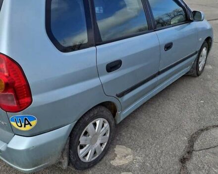 Синий Мицубиси Спейс Стар, объемом двигателя 1.6 л и пробегом 340 тыс. км за 2900 $, фото 1 на Automoto.ua