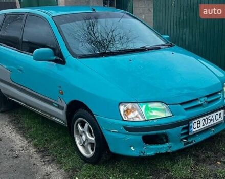 Зеленый Мицубиси Спейс Стар, объемом двигателя 1.3 л и пробегом 430 тыс. км за 2500 $, фото 4 на Automoto.ua