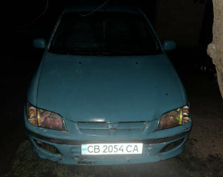 Зеленый Мицубиси Спейс Стар, объемом двигателя 1.3 л и пробегом 430 тыс. км за 2500 $, фото 26 на Automoto.ua