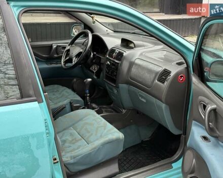 Зеленый Мицубиси Спейс Стар, объемом двигателя 1.3 л и пробегом 203 тыс. км за 3000 $, фото 10 на Automoto.ua