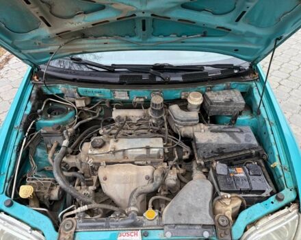 Зеленый Мицубиси Спейс Стар, объемом двигателя 1.3 л и пробегом 205 тыс. км за 3000 $, фото 16 на Automoto.ua