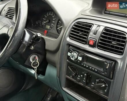 Зеленый Мицубиси Спейс Стар, объемом двигателя 1.3 л и пробегом 203 тыс. км за 3000 $, фото 13 на Automoto.ua