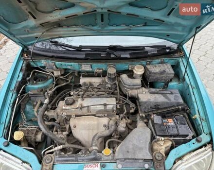 Зеленый Мицубиси Спейс Стар, объемом двигателя 1.3 л и пробегом 203 тыс. км за 3000 $, фото 16 на Automoto.ua