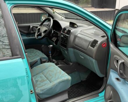 Зеленый Мицубиси Спейс Стар, объемом двигателя 1.3 л и пробегом 205 тыс. км за 3000 $, фото 10 на Automoto.ua