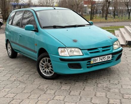 Зеленый Мицубиси Спейс Стар, объемом двигателя 1.3 л и пробегом 205 тыс. км за 3000 $, фото 2 на Automoto.ua