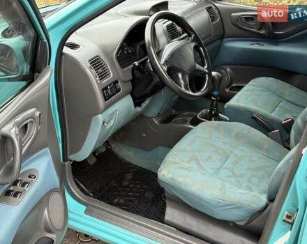 Зеленый Мицубиси Спейс Стар, объемом двигателя 1.3 л и пробегом 203 тыс. км за 3000 $, фото 6 на Automoto.ua