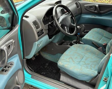 Зеленый Мицубиси Спейс Стар, объемом двигателя 1.3 л и пробегом 205 тыс. км за 3000 $, фото 6 на Automoto.ua