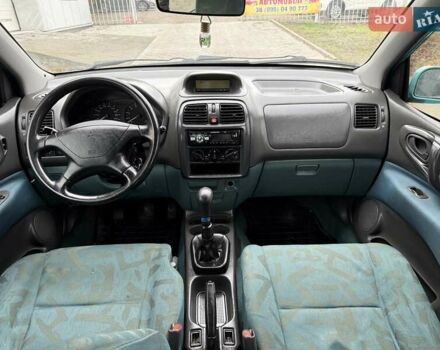 Зеленый Мицубиси Спейс Стар, объемом двигателя 1.3 л и пробегом 203 тыс. км за 3000 $, фото 12 на Automoto.ua