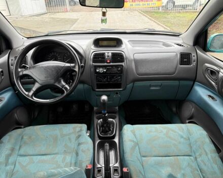 Зеленый Мицубиси Спейс Стар, объемом двигателя 1.3 л и пробегом 205 тыс. км за 3000 $, фото 12 на Automoto.ua