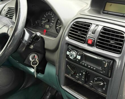 Зеленый Мицубиси Спейс Стар, объемом двигателя 1.3 л и пробегом 205 тыс. км за 3000 $, фото 13 на Automoto.ua