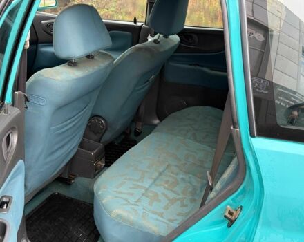 Зеленый Мицубиси Спейс Стар, объемом двигателя 1.3 л и пробегом 205 тыс. км за 3000 $, фото 8 на Automoto.ua