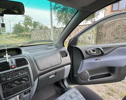 Зеленый Мицубиси Спейс Стар, объемом двигателя 1.83 л и пробегом 155 тыс. км за 3500 $, фото 6 на Automoto.ua