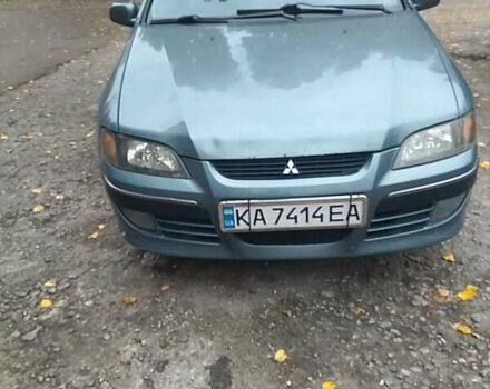 Зеленый Мицубиси Спейс Стар, объемом двигателя 1.58 л и пробегом 330 тыс. км за 3300 $, фото 3 на Automoto.ua