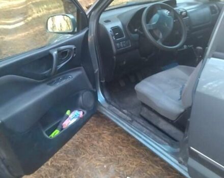 Зеленый Мицубиси Спейс Стар, объемом двигателя 1.58 л и пробегом 330 тыс. км за 3300 $, фото 6 на Automoto.ua