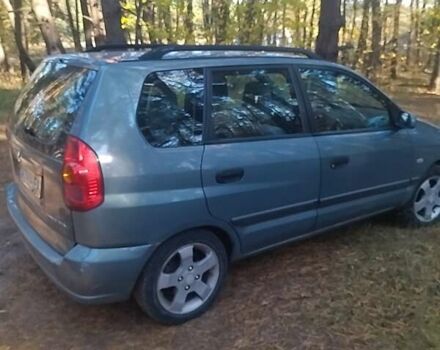 Зеленый Мицубиси Спейс Стар, объемом двигателя 1.58 л и пробегом 330 тыс. км за 3300 $, фото 1 на Automoto.ua