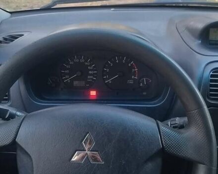 Зеленый Мицубиси Спейс Стар, объемом двигателя 1.58 л и пробегом 330 тыс. км за 3300 $, фото 2 на Automoto.ua