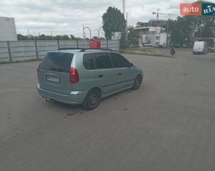 Зеленый Мицубиси Спейс Стар, объемом двигателя 1.3 л и пробегом 389 тыс. км за 2200 $, фото 1 на Automoto.ua