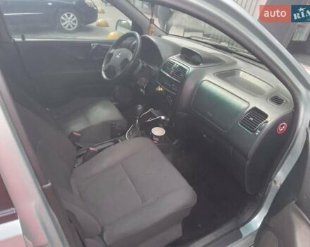 Зеленый Мицубиси Спейс Стар, объемом двигателя 1.3 л и пробегом 389 тыс. км за 2200 $, фото 5 на Automoto.ua