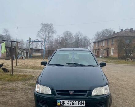 Зеленый Мицубиси Спейс Стар, объемом двигателя 1.3 л и пробегом 280 тыс. км за 1700 $, фото 1 на Automoto.ua