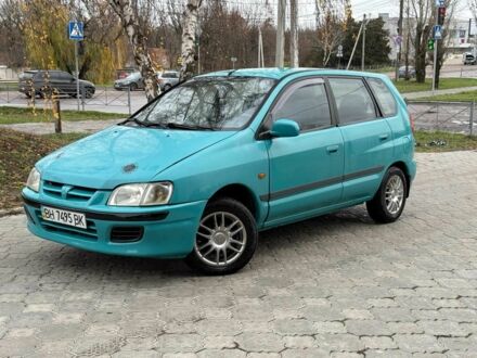 Зеленый Мицубиси Спейс Стар, объемом двигателя 1.3 л и пробегом 205 тыс. км за 3000 $, фото 1 на Automoto.ua