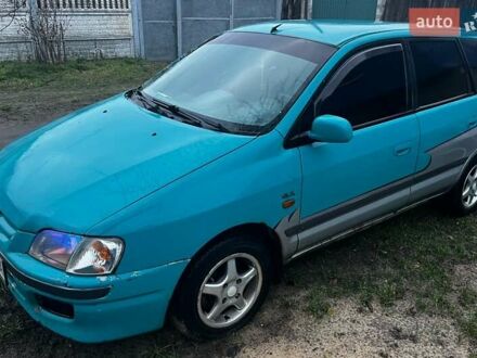 Зеленый Мицубиси Спейс Стар, объемом двигателя 1.3 л и пробегом 430 тыс. км за 2500 $, фото 1 на Automoto.ua