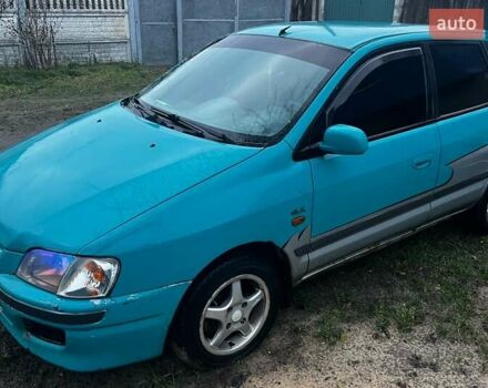 Зеленый Мицубиси Спейс Стар, объемом двигателя 1.3 л и пробегом 430 тыс. км за 2500 $, фото 1 на Automoto.ua