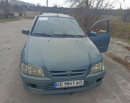 Зеленый Мицубиси Спейс Стар, объемом двигателя 1.6 л и пробегом 319 тыс. км за 1800 $, фото 1 на Automoto.ua