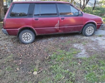 Красный Мицубиси Спейс Вагон, объемом двигателя 1.8 л и пробегом 325 тыс. км за 1150 $, фото 2 на Automoto.ua