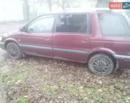 Красный Мицубиси Спейс Вагон, объемом двигателя 2 л и пробегом 300 тыс. км за 1700 $, фото 5 на Automoto.ua