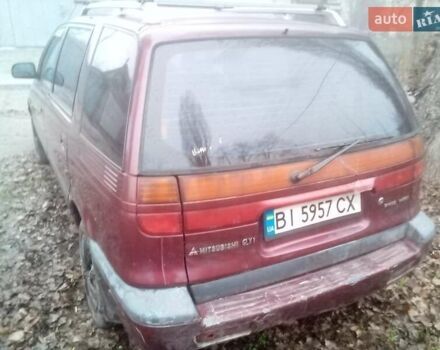 Красный Мицубиси Спейс Вагон, объемом двигателя 2 л и пробегом 300 тыс. км за 1700 $, фото 8 на Automoto.ua