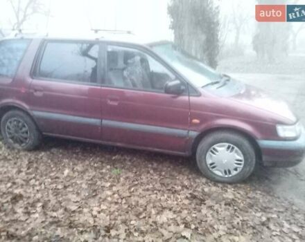 Красный Мицубиси Спейс Вагон, объемом двигателя 2 л и пробегом 300 тыс. км за 1700 $, фото 10 на Automoto.ua