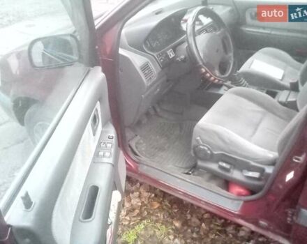 Красный Мицубиси Спейс Вагон, объемом двигателя 2 л и пробегом 300 тыс. км за 1700 $, фото 7 на Automoto.ua