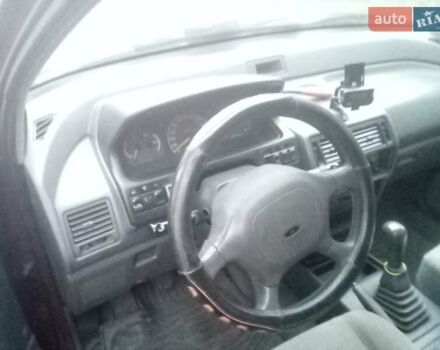 Красный Мицубиси Спейс Вагон, объемом двигателя 2 л и пробегом 300 тыс. км за 1700 $, фото 4 на Automoto.ua