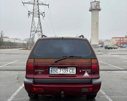 Красный Мицубиси Спейс Вагон, объемом двигателя 2 л и пробегом 480 тыс. км за 3500 $, фото 1 на Automoto.ua