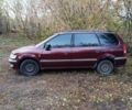 Красный Мицубиси Спейс Вагон, объемом двигателя 2.4 л и пробегом 200 тыс. км за 2944 $, фото 1 на Automoto.ua