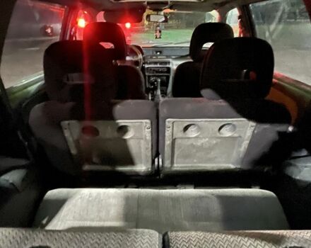 Красный Мицубиси Спейс Вагон, объемом двигателя 2 л и пробегом 300 тыс. км за 1050 $, фото 5 на Automoto.ua