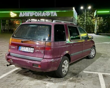 Красный Мицубиси Спейс Вагон, объемом двигателя 2 л и пробегом 300 тыс. км за 1050 $, фото 2 на Automoto.ua