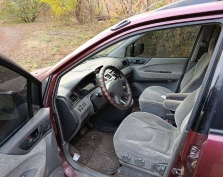 Красный Мицубиси Спейс Вагон, объемом двигателя 2.4 л и пробегом 200 тыс. км за 2944 $, фото 4 на Automoto.ua