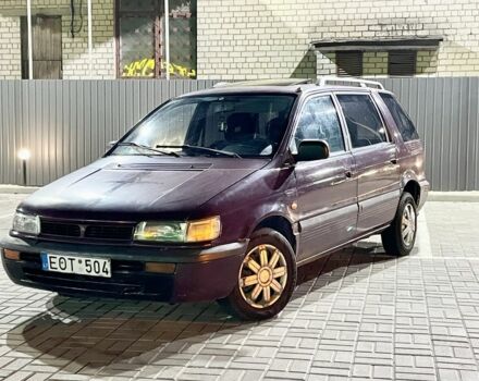 Красный Мицубиси Спейс Вагон, объемом двигателя 2 л и пробегом 300 тыс. км за 1050 $, фото 1 на Automoto.ua