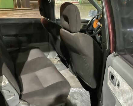 Красный Мицубиси Спейс Вагон, объемом двигателя 2 л и пробегом 300 тыс. км за 1050 $, фото 6 на Automoto.ua