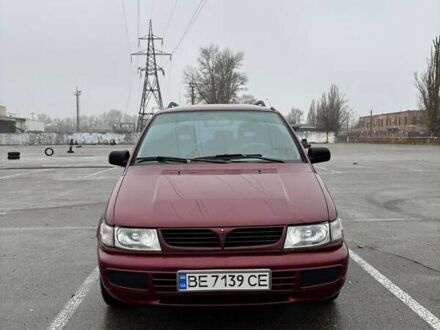 Красный Мицубиси Спейс Вагон, объемом двигателя 2 л и пробегом 480 тыс. км за 3500 $, фото 1 на Automoto.ua