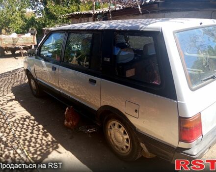 Серый Мицубиси Спейс Вагон, объемом двигателя 2 л и пробегом 200 тыс. км за 700 $, фото 1 на Automoto.ua