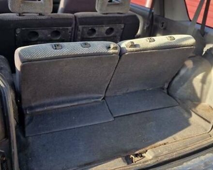 Серый Мицубиси Спейс Вагон, объемом двигателя 1.8 л и пробегом 410 тыс. км за 2000 $, фото 20 на Automoto.ua