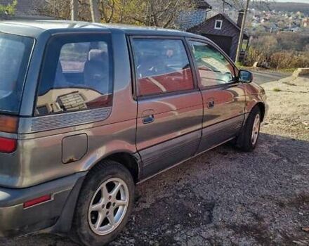 Серый Мицубиси Спейс Вагон, объемом двигателя 1.8 л и пробегом 410 тыс. км за 2000 $, фото 2 на Automoto.ua