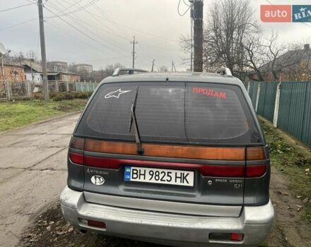 Серый Мицубиси Спейс Вагон, объемом двигателя 1.8 л и пробегом 300 тыс. км за 1500 $, фото 3 на Automoto.ua